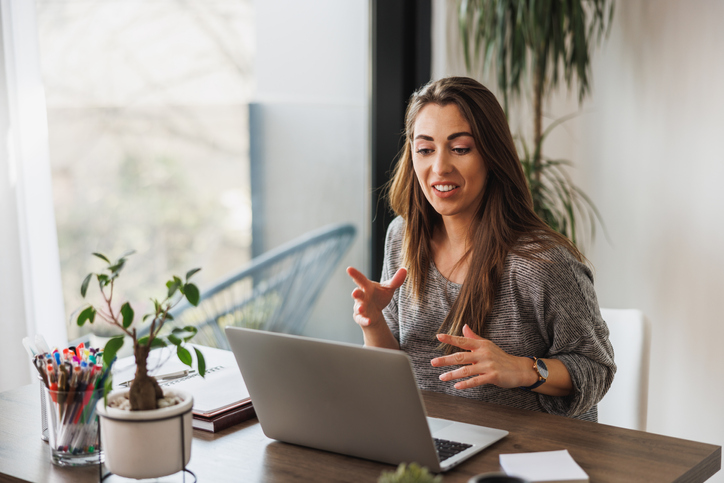 A financial advisor explaining to her client in an online meeting how tax exempt accounts work.